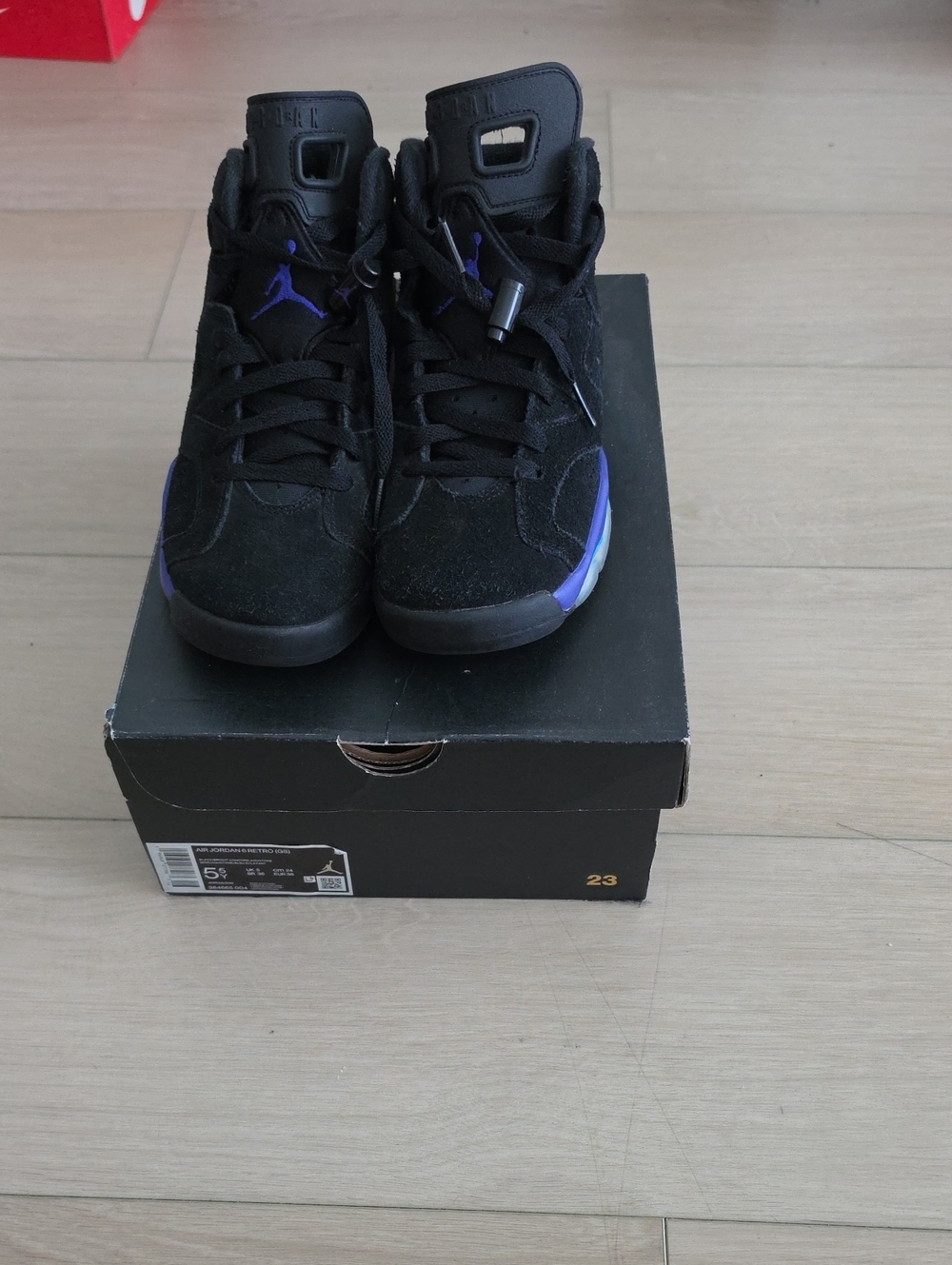 Jordan High-Top Sneakers in Black with Purple Accents
